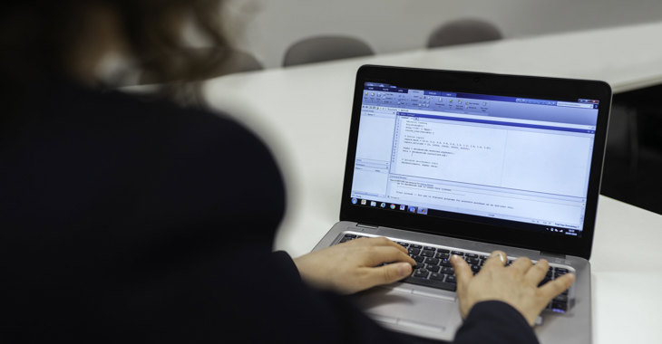 Female Aerospace Engineer Inputs Data