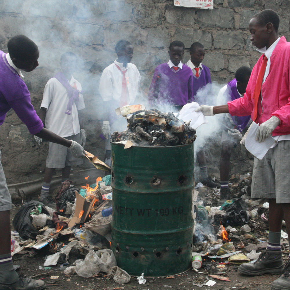Wasteaid Students Burning Waste In Kwa Muhia Kenya 2011
